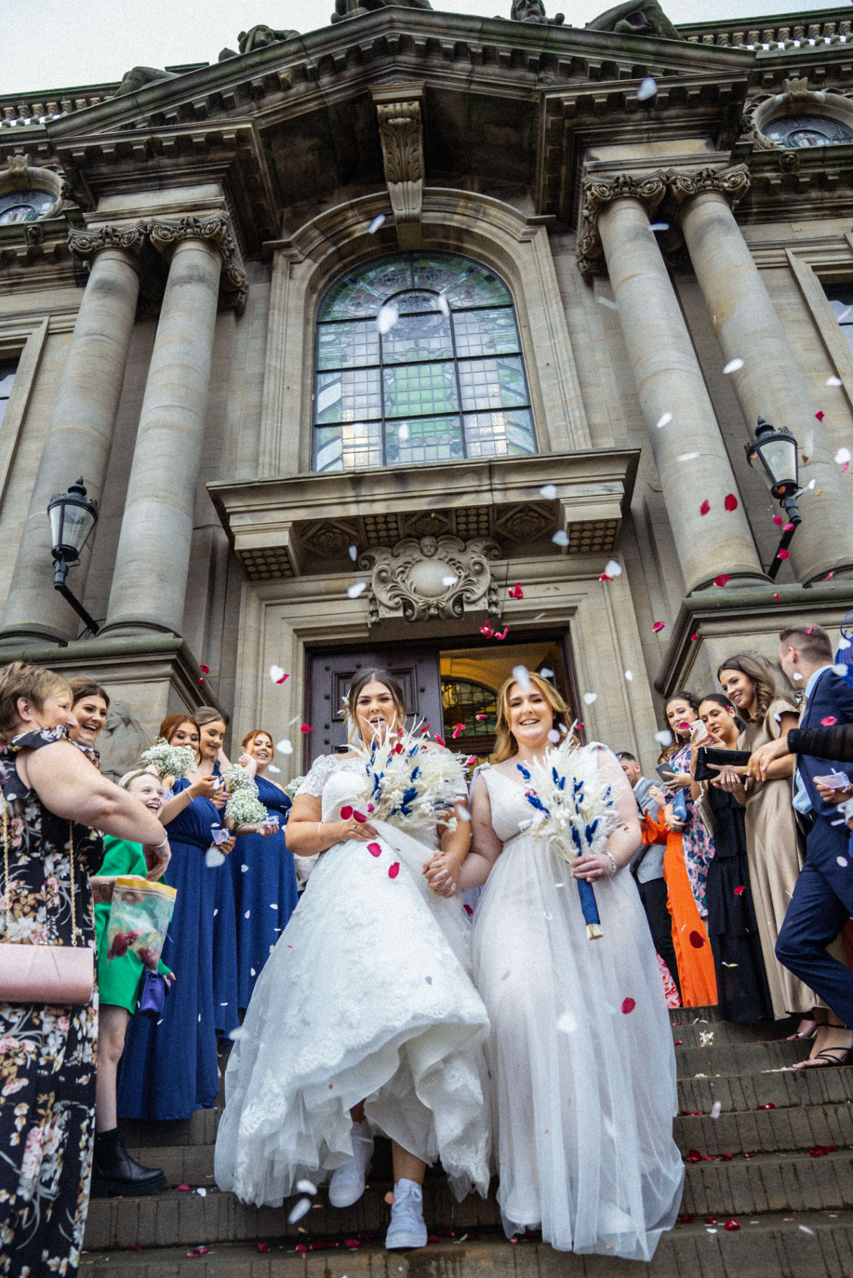 Confetti shower over newlyweds at a Newcastle wedding