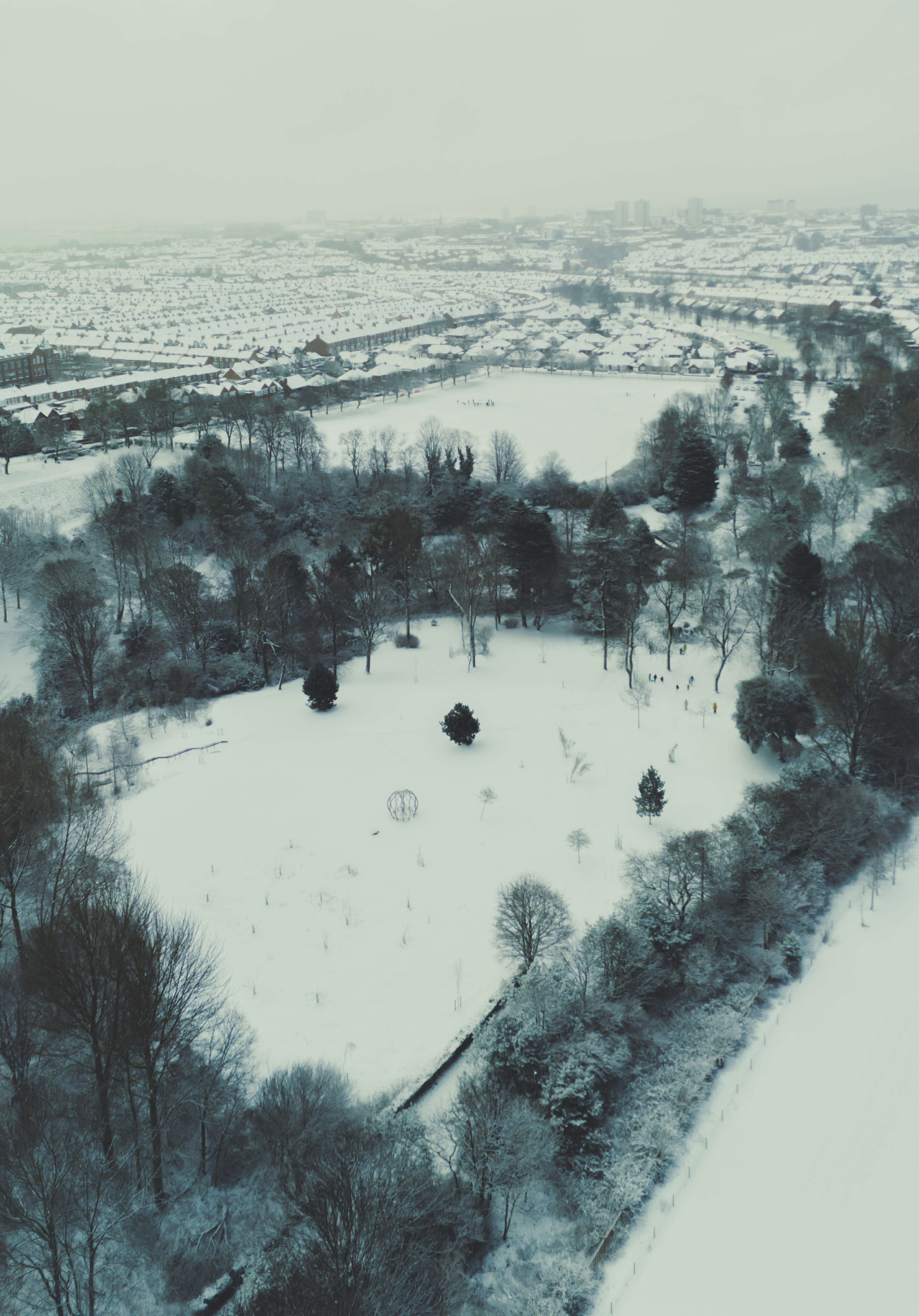 Aerial drone shot of a snow-covered North East landscape